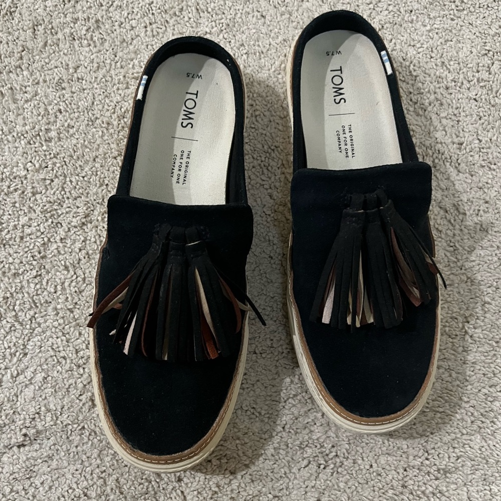 Toms. Black suede slides.